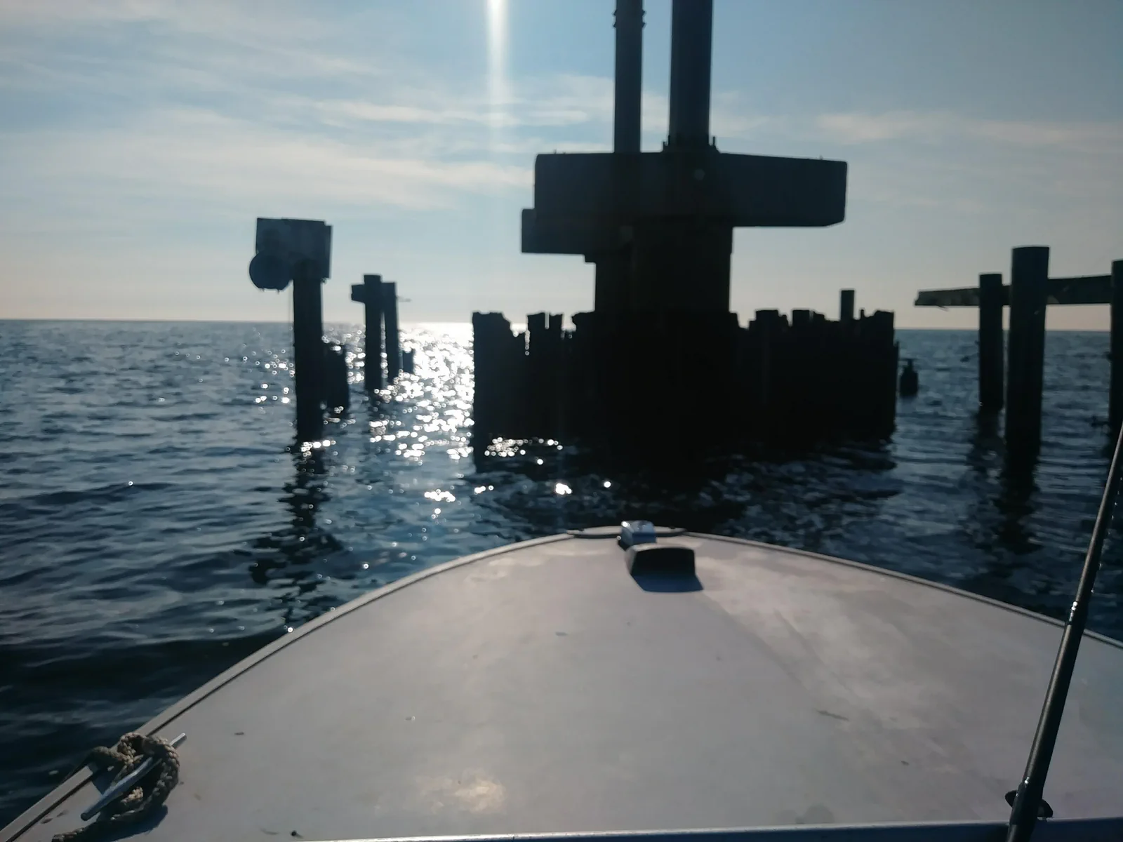 Boat bow approaching open water structure in Southeast Louisiana
